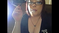 Chubby Mistress Dangles Her Cigarettes As She Smokes