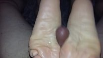 Wife Gives Closeup Footjob Cumshot